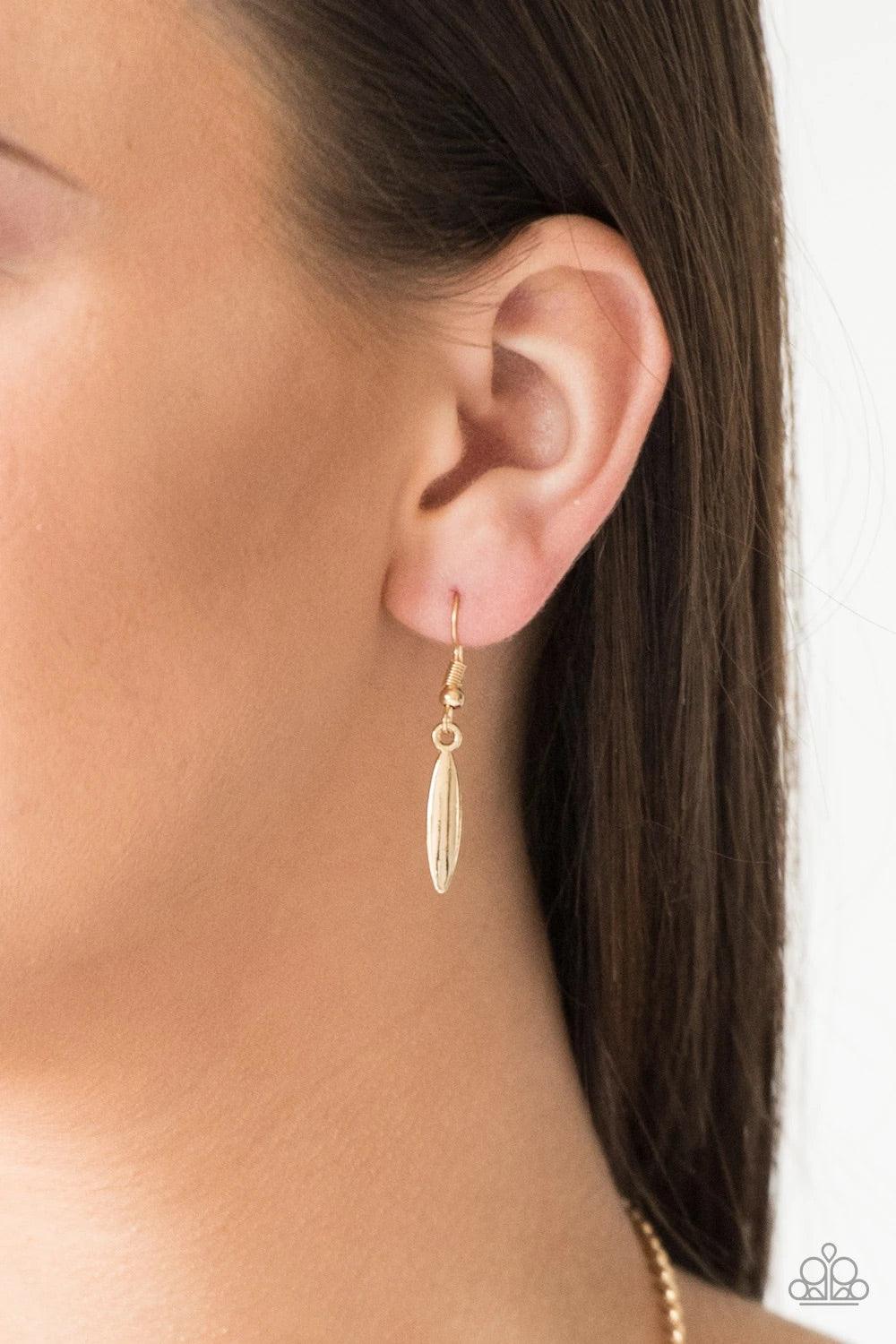 Paparazzi Accessories Terra Trailbreaker ~Gold Varying in shape, a collection of dainty gold frames coalesce into a striking crescent pendant below the collar for a statement making look. Features an adjustable clasp closure. Sold as one individual neckla