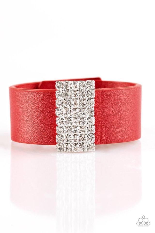 Paparazzi Accessories Walk The CATWALK ~Red Encrusted in glittery white rhinestones, a sparkling frame slides along a strip of red leather, creating a blinding centerpiece. Features an adjustable snap closure. Sold as one individual bracelet.