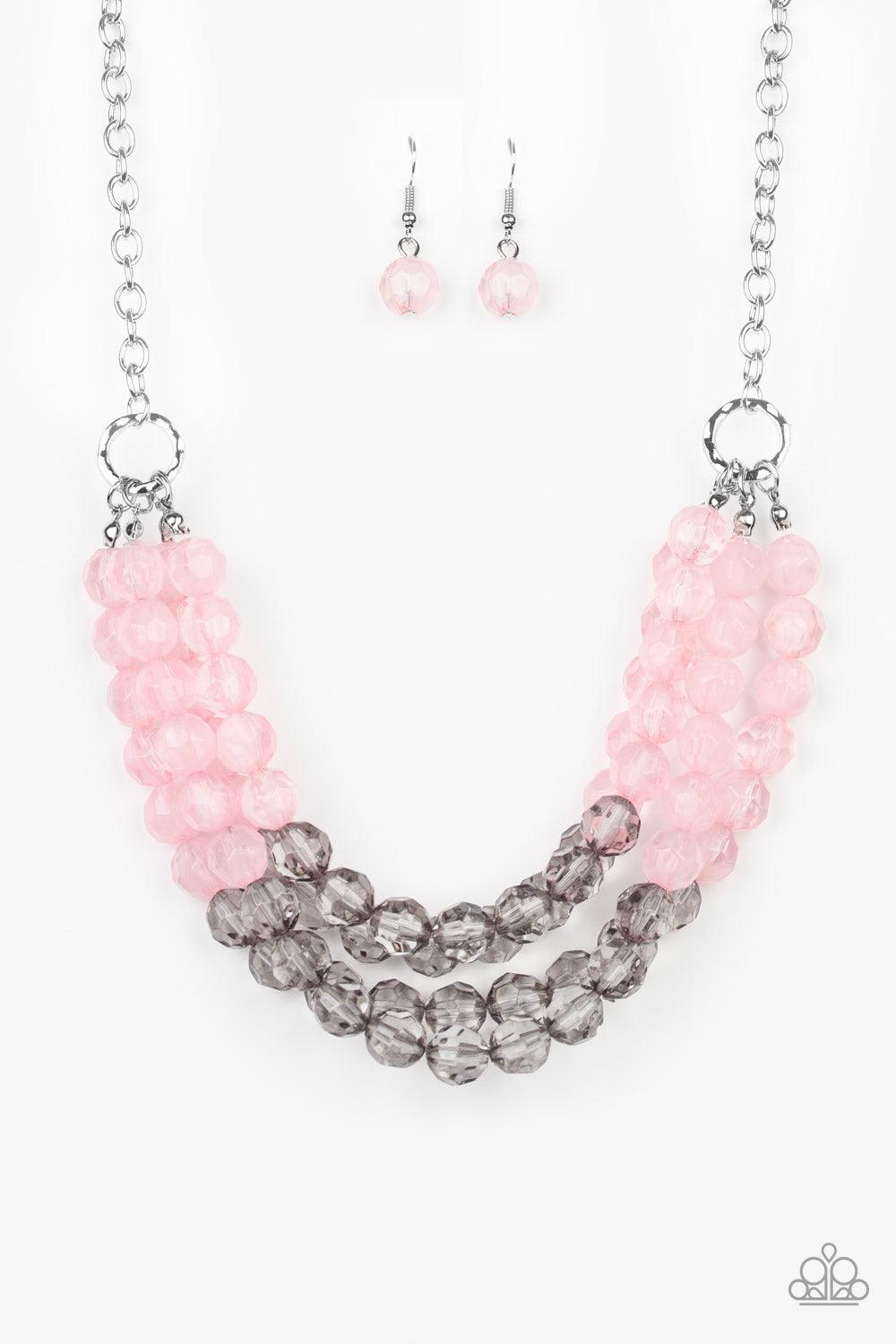 Paparazzi Accessories Summer Ice - Pink Featuring cloudy and glassy finishes, strands of faceted pink and gray crystal-like beads alternate below the collar, creating colorfully icy layers. Features an adjustable clasp closure. Sold as one individual neck