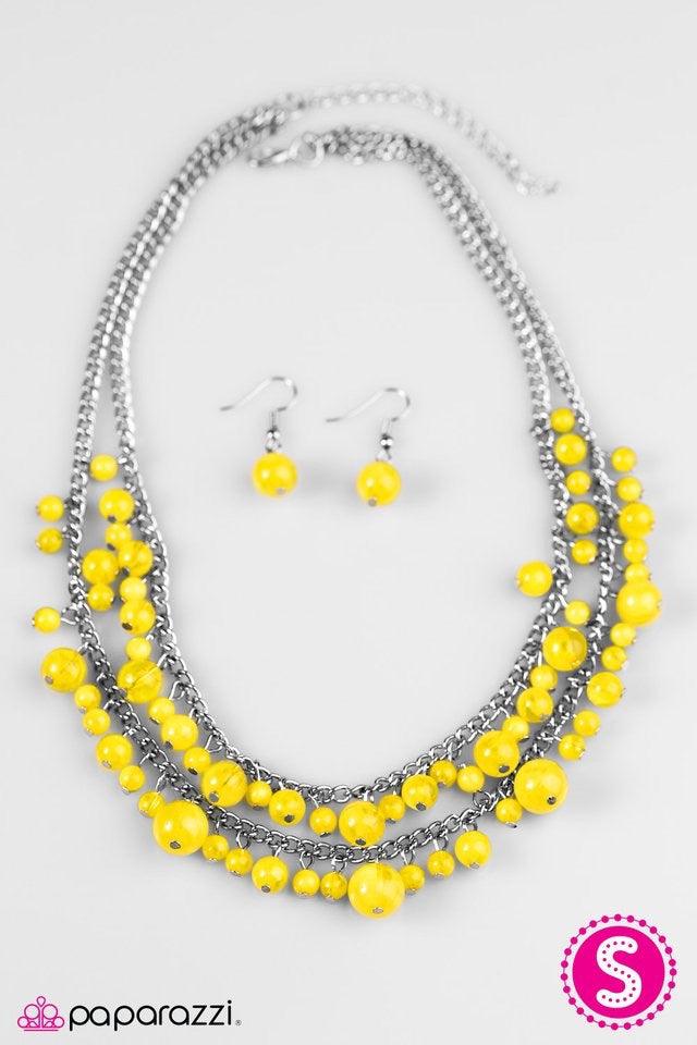 Paparazzi Accessories Summer Isles - Yellow Glassy Yellow beading trickles along two shimmery silver chains, creating colorful layers below the collar. Featuring a variety of opacity and size, the gorgeous beading falls into a summery inspired fashion. Fe