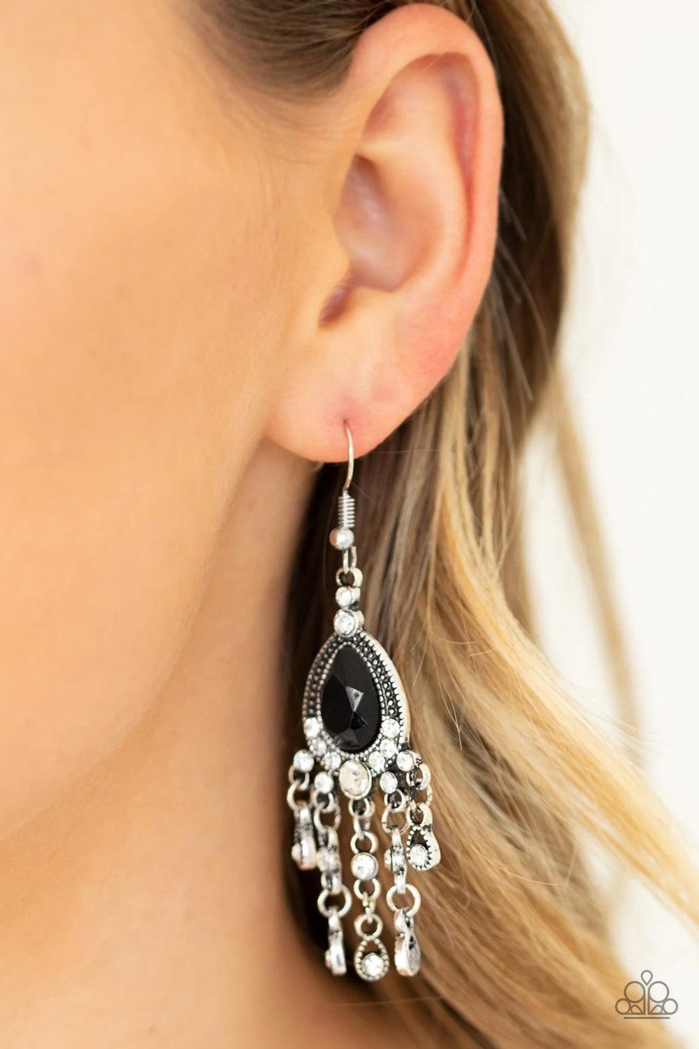 Paparazzi Accessories Bling Bliss - Black Dotted with dainty white rhinestones, silver teardrop frames cascade from the bottom of an oversized black teardrop gem encrusted frame, creating a timeless chandelier. Earring attaches to a standard fishhook fitt