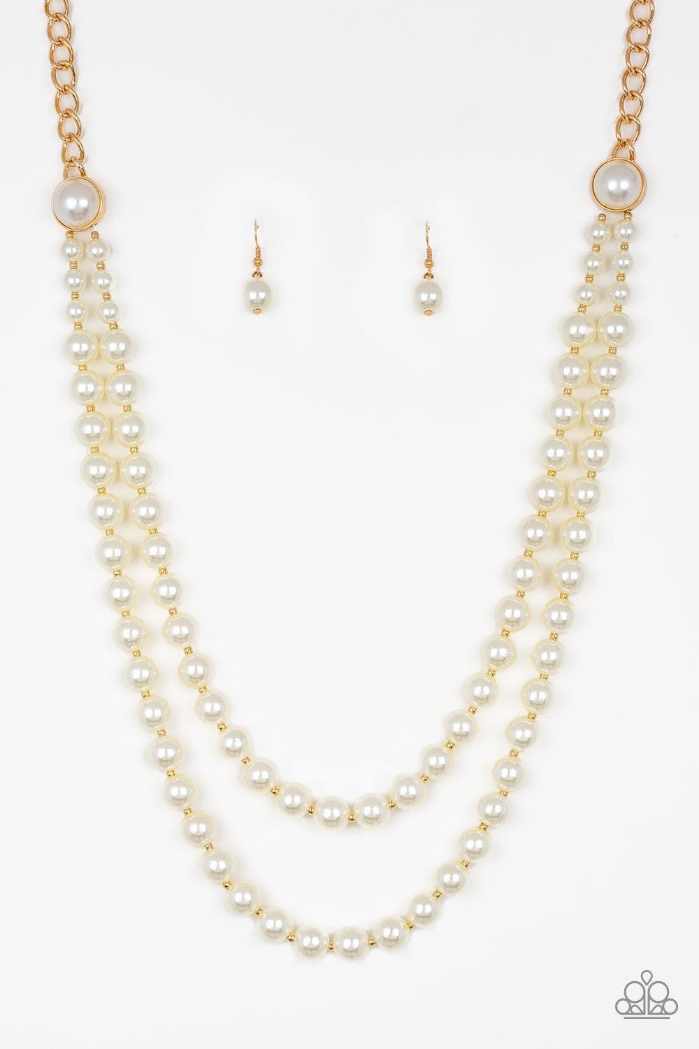 Paparazzi Accessories Endless Elegance - Gold A dramatic gold chain gives way to two strands of pearly white beads. Infused with matching pearl fittings and dainty gold accents, the beaded strand drapes down the chest in a refined fashion. Features an adj