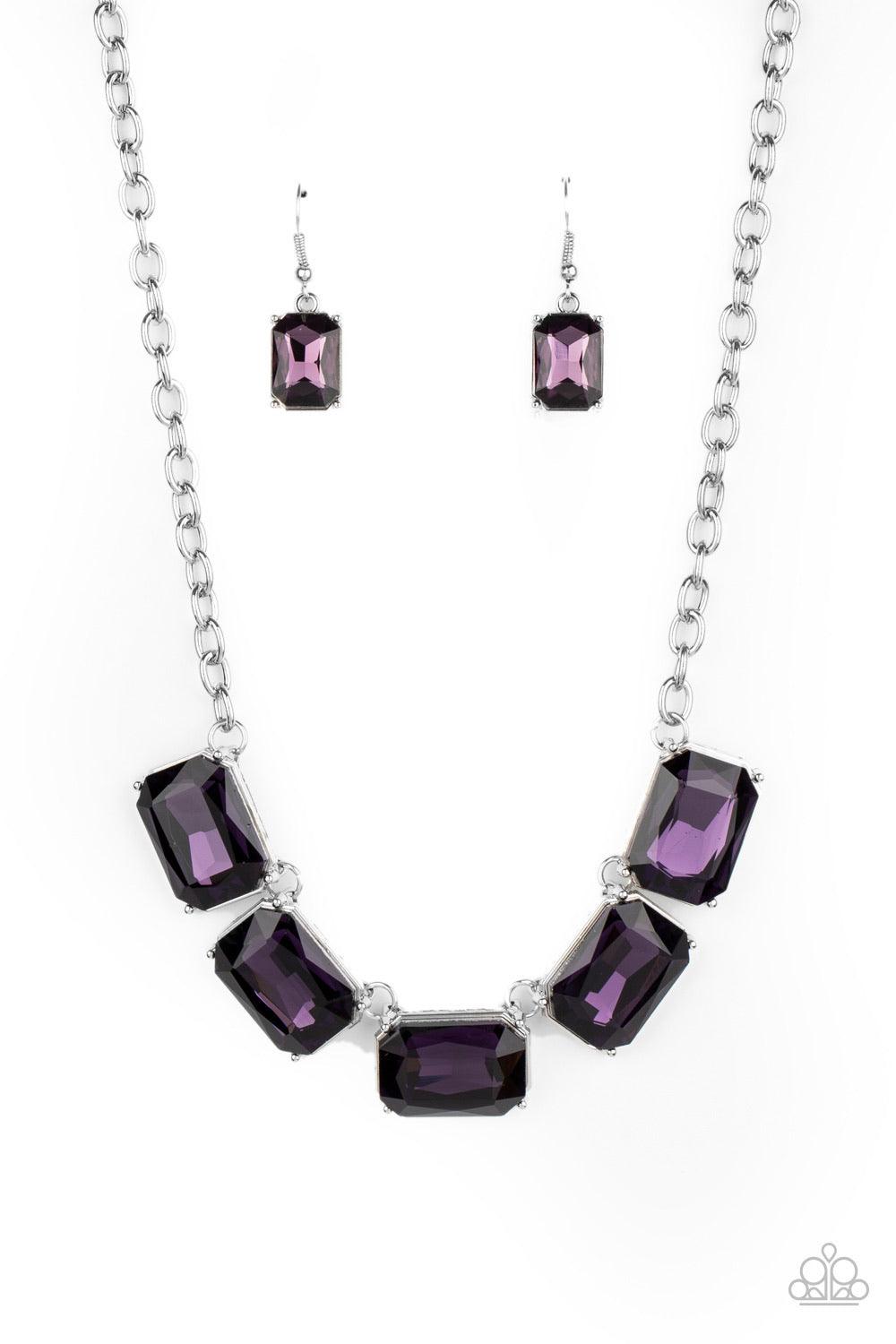 Paparazzi Accessories Deep Freeze Diva - Purple Deep Freeze Diva - Purple P2ST-PRXX-080XX Featuring regal emerald style cuts, an oversized collection of purple rhinestones dramatically link below the collar for an icy finish. Features an adjustable clasp