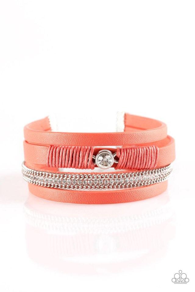 Paparazzi Accessories Catwalk Craze - Orange Coral leather strands layer across the wrist. Infused with silver chain and white rhinestone accents, coral cording knots around a leather strand, securing a solitaire white rhinestone in place for a whimsical
