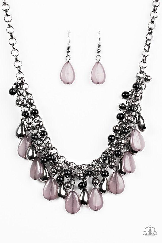Paparazzi Accessories Diva Attitude - Black Glistening gunmetal and smoky teardrops drip from the bottom of interlocking gunmetal chains. Matching gunmetal and black beads trickle down the rows of chain, creating a bold fringe below the collar. Features a