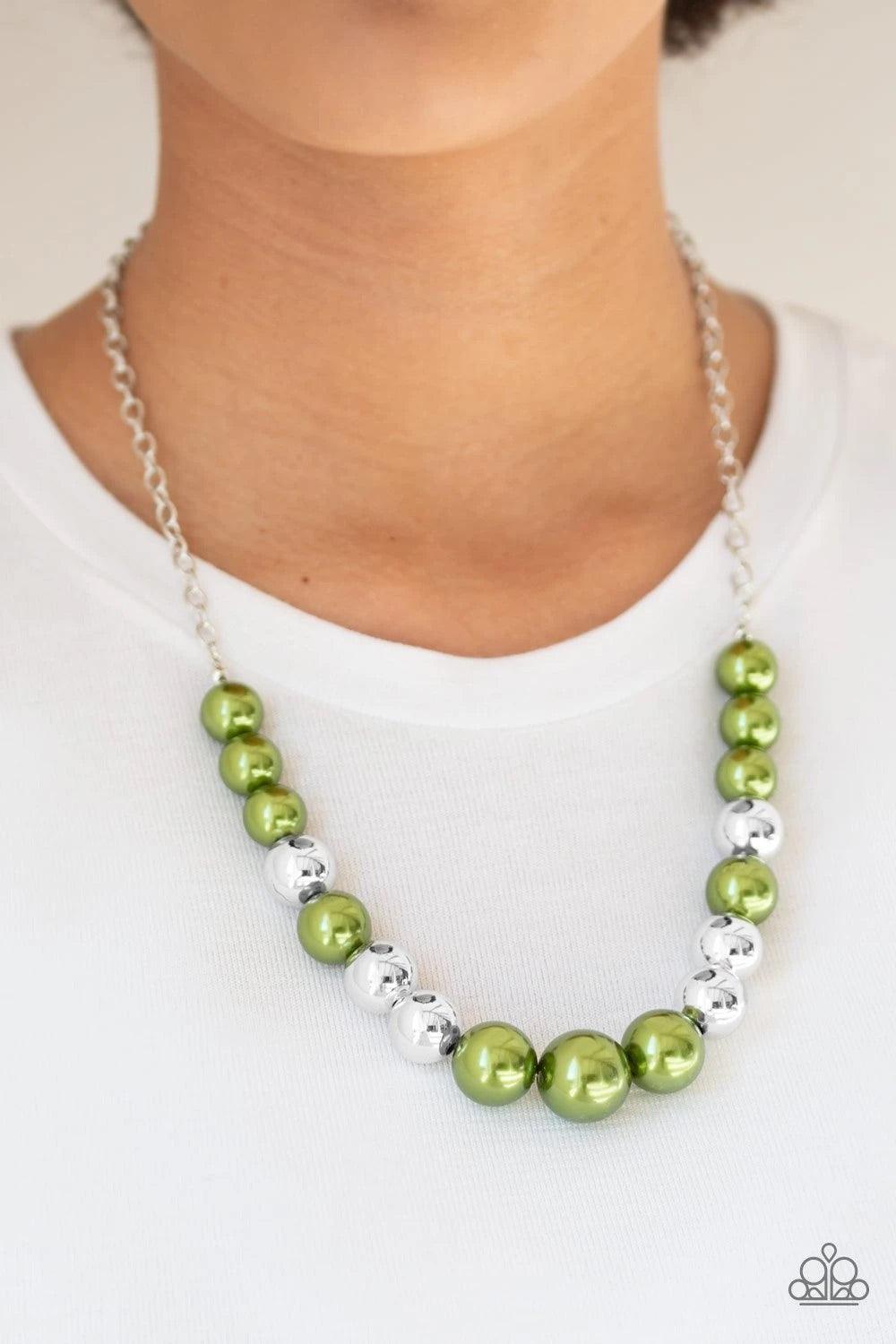Paparazzi Accessories Take Note - Green A collection of oversized silver and pearly green beads drape across the chest for a refined look. Features an adjustable clasp closure. Sold as one individual necklace. Includes one pair of matching earrings. Jewel