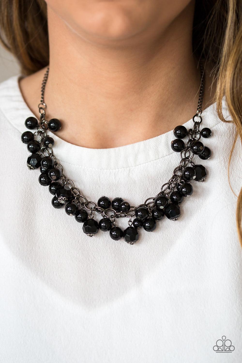 Paparazzi Accessories Time To RUNWAY - Black Glassy, polished, and faceted crystal-like beading trickle from the bottom of interlocked gunmetal chains, creating a fierce fringe. Features an adjustable clasp closure. Sold as one individual necklace. Includ