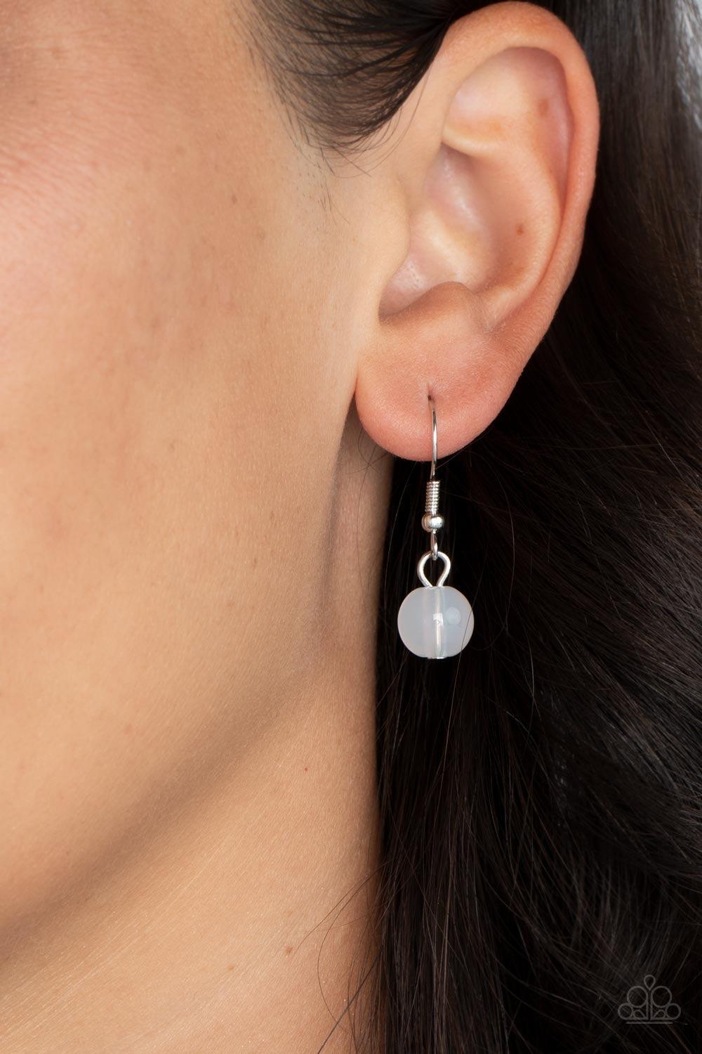 Paparazzi Accessories Astral Ascension- Multi An opaque white bead is pressed into the center of a gold star that dances from the top of a silver half moon pendant, creating a celestial pendant at the bottom of a lengthened silver snake chain. Features an