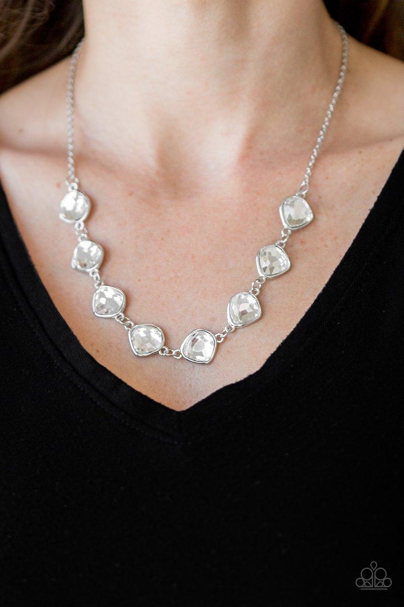 Paparazzi Accessories The Imperfectionist - Silver Featuring shimmery silver frames, imperfect white gems link below the collar for a glamorous vintage inspired look. Features an adjustable clasp closure. Sold as one individual necklace. Includes one pair