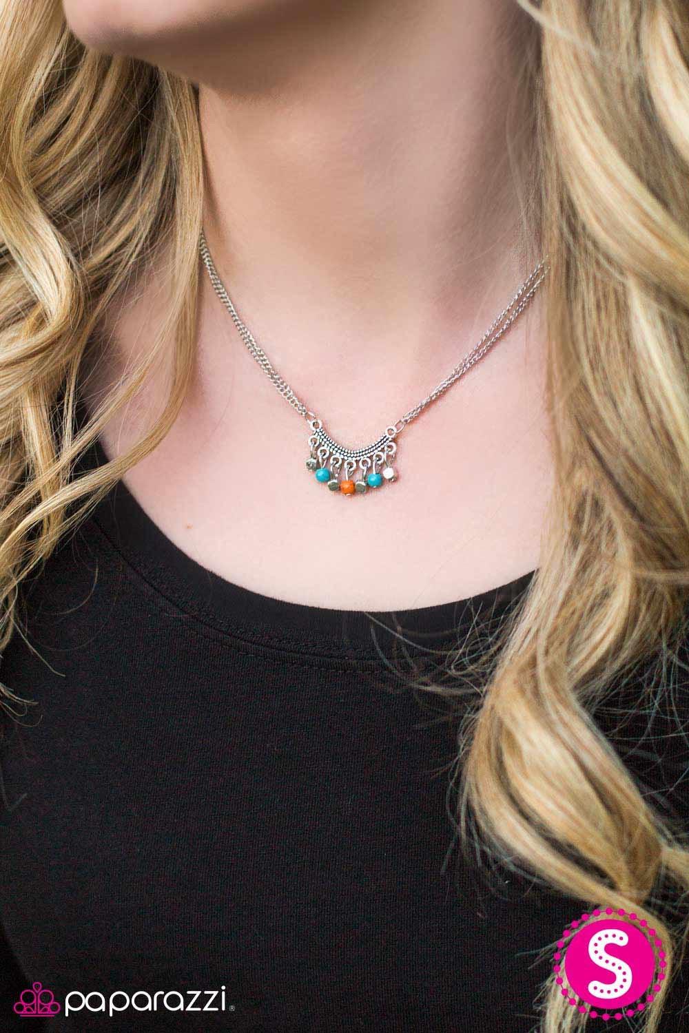 Paparazzi Accessories Living In Harmony - Multi Vivacious turquoise and orange stone beads swing from the bottom of a dainty silver pendant. The bowing pendant is embossed in tactile textures as silver cube beads are added to the colorful fringe, creating