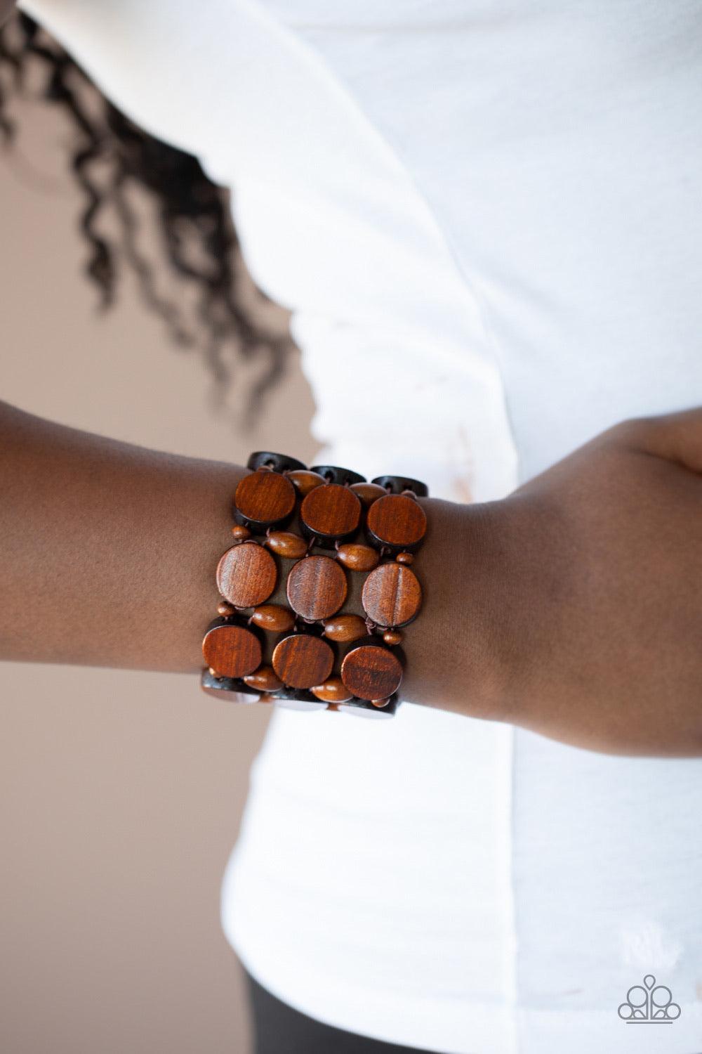 Paparazzi Accessories Cruising Coronado - Brown Cruising Coronado - Brown P9SE-BNXX-155XX Featuring disc, oval, and rounded shapes, a mismatched collection of earthy wooden beads are threaded along knotted stretchy strands, creating a tropical inspired lo