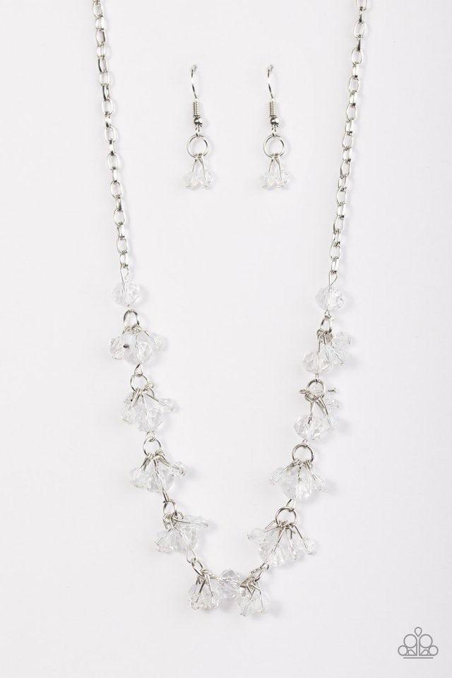 Paparazzi Accessories Leading STARLIGHT - White Glassy and faceted white crystal beading trickles along a silver chain, creating a dramatic fringe below the collar. Featuring elegant pear-shaped cuts, iridescent crystals cluster atop the glassy gems for a