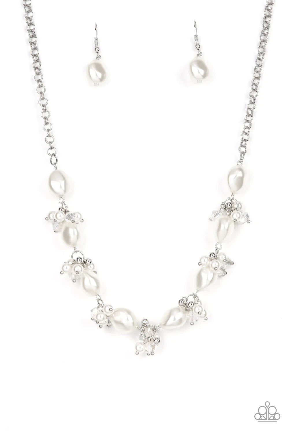 Paparazzi Accessories Rolling with the BRUNCHES - White An oval brown cat's eye gemstone sits atop a pronged silver frame along two layered silver bands, resulting in an enchanting centerpiece atop the finger. Features a stretchy band for a flexible fit.