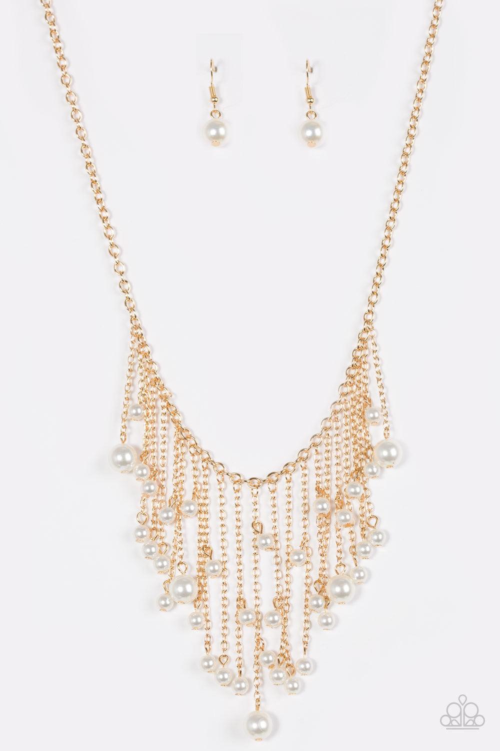 Paparazzi Accessories Catwalk Champ - Gold Varying in length, glistening gold chains swing from the bottom of a bold gold chain. Pearly white beads trickle down the chains, creating a fierce fringe below the collar. Features an adjustable clasp closure. S