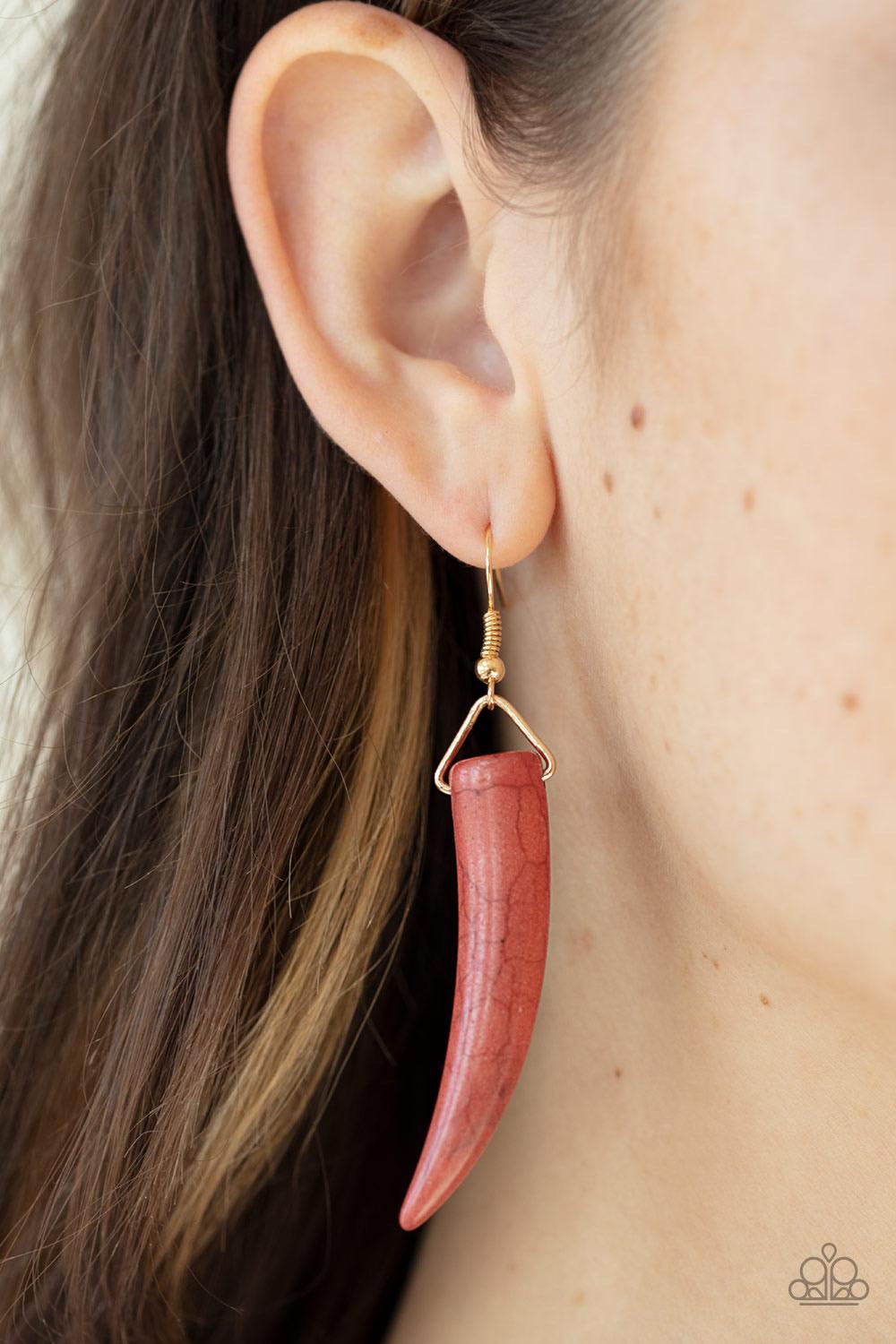 Paparazzi Accessories Tusk Tundra - Brown Infused with dainty gold beads, tusk-shaped Cinnamon Stick stone beads are threaded along an invisible wire below the collar, creating a wild fringe. Features an adjustable clasp closure. Sold as one individual ne