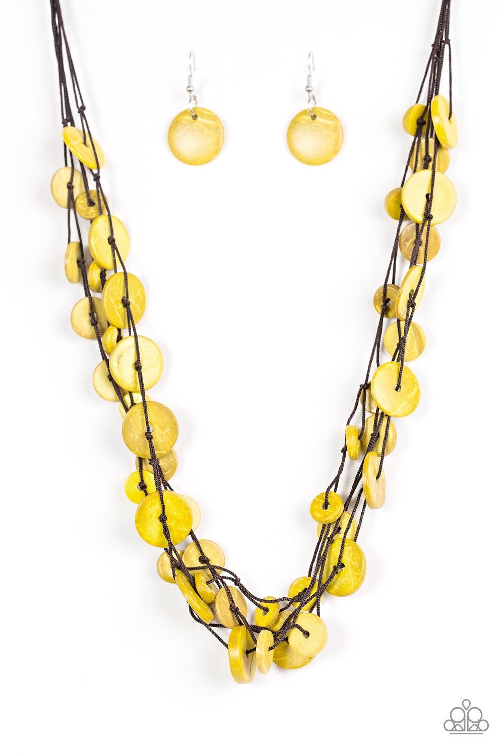 Paparazzi Accessories Bermuda Beach House - Yellow Tinted in a yellow finish, distressed wooden discs trickle along strands of knotted brown cording, creating colorful layers below the collar for a seasonal vibe. Features a button-loop closure. Jewelry