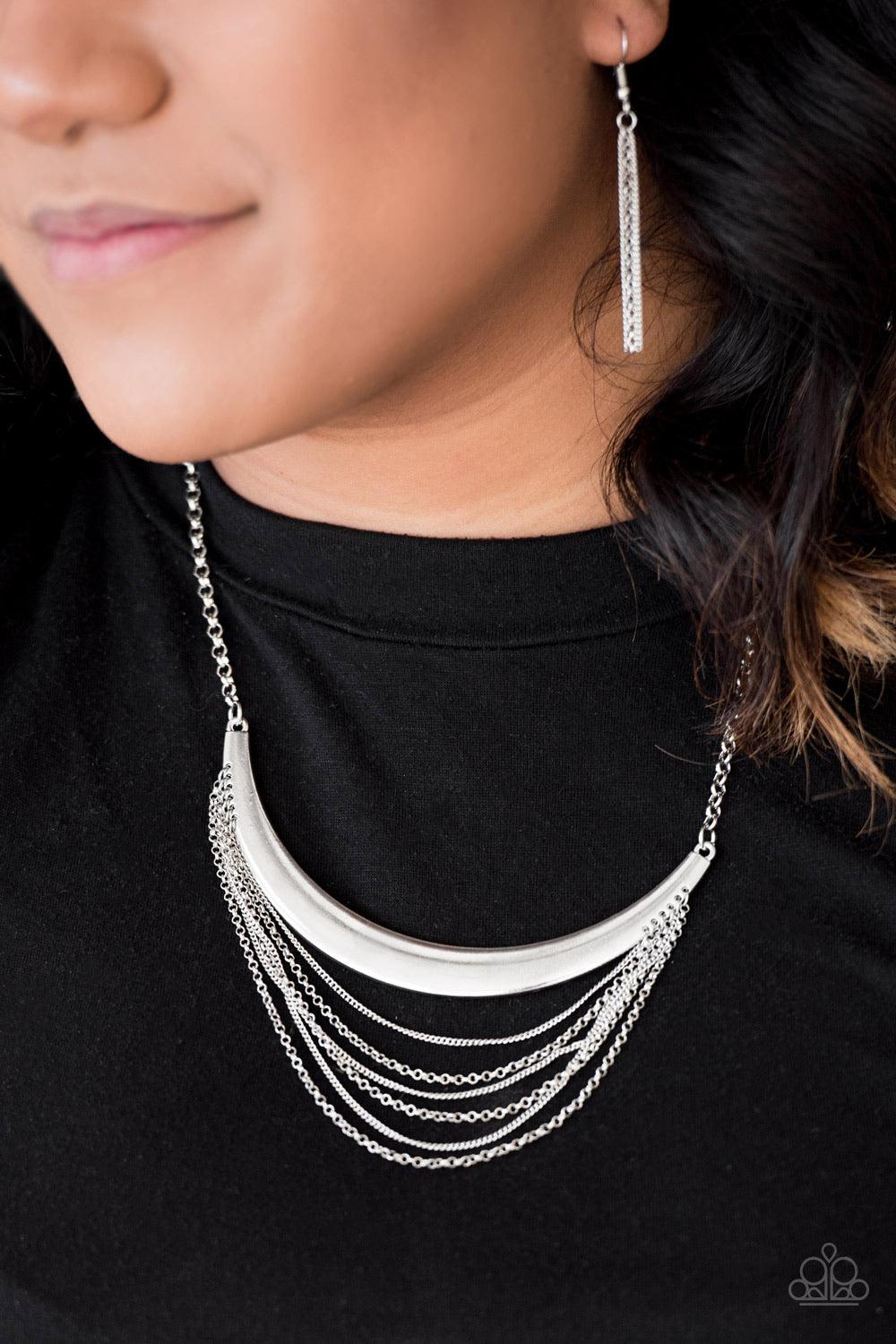 Paparazzi Accessories Way Wayfarer ~Silver Rows of mismatched silver chains connect to a glistening silver crescent, creating horizontal layers down the chest for a wanderlust look. Features an adjustable clasp closure. Sold as one individual necklace. In