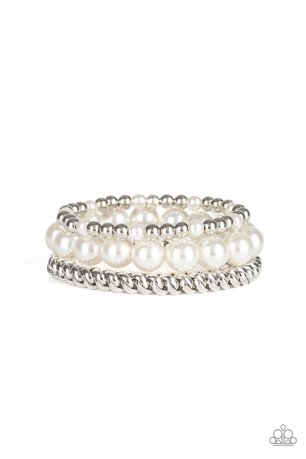 Paparazzi Accessories A PEARL-fect Ten - White A refined collection of dainty silver beads, oversized pearls, and exaggerated silver chain are threaded along stretchy bands around the wrist for a vintage inspired look. Jewelry