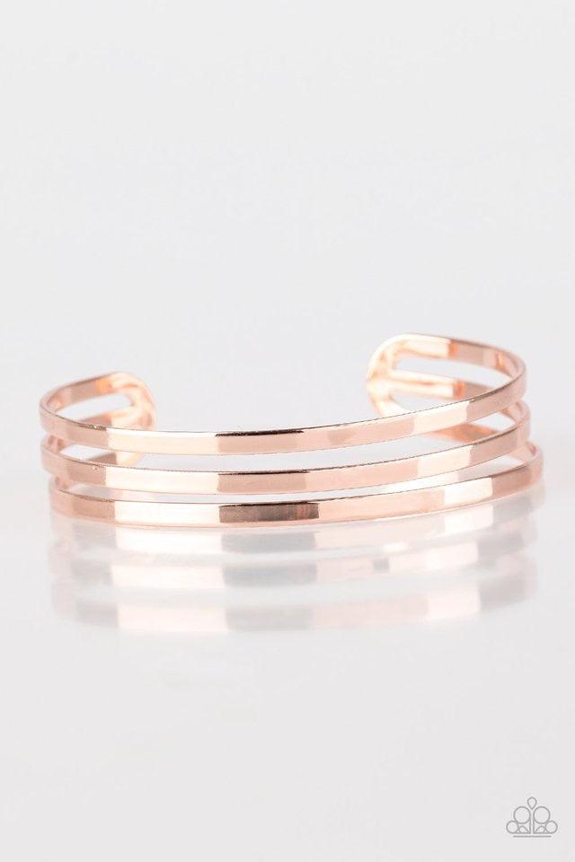 Paparazzi Accessories Street Sleek - Rose Gold Flat rose gold bars race across the wrist, coalescing into a sleek cuff for a casual look. Jewelry