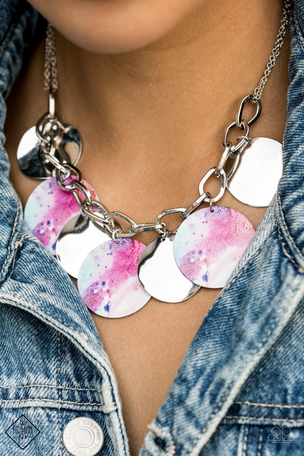 Paparazzi Accessories Tie Dye Drama ~Multi Featuring a galactic tie dye print, flat colorful discs swirled in tones of blue and purple combine with curved silver discs, swinging from the bottom of a bulky silver chain for a trendy throwback look. Features