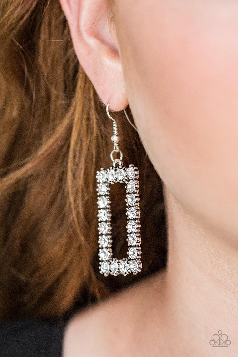 Paparazzi Accessories Mirror, Mirror - White Glittery white rhinestones are encrusted along a silver rectangular frame, creating a glamorous lure. Earring attaches to a standard fishhook fitting. Jewelry