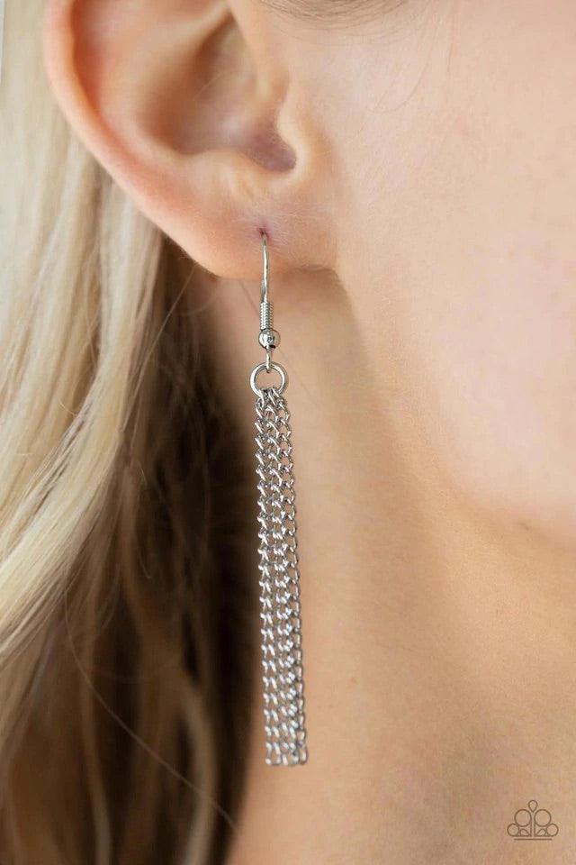 Paparazzi Accessories Wondrously Woven - Red Featuring a faux woven finish, a shiny piece of Fire Whirl leather is pressed into a studded circular frame at the bottom of a lengthened silver chain. Capped in a frame, a silver chain tassel streams out from