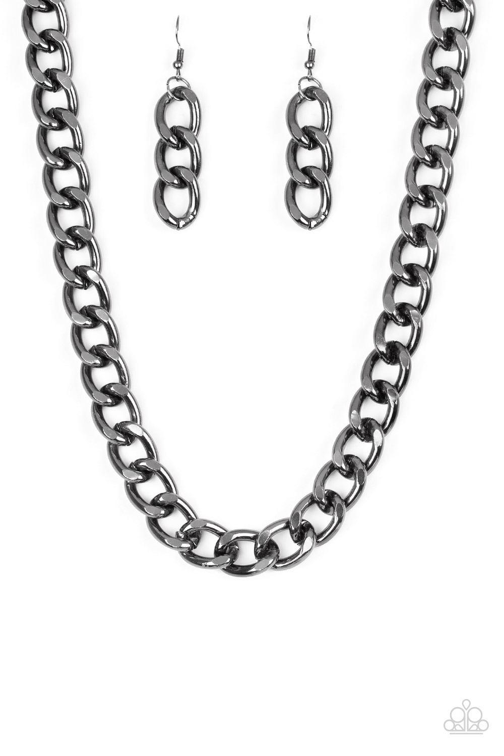 Paparazzi Accessories Heavyweight Champion - Black Brushed in a high-sheen shimmer, a bold gunmetal chain drapes below the collar in an edgy industrial fashion. Features an adjustable clasp closure. Sold as one individual necklace. Includes one pair of ma