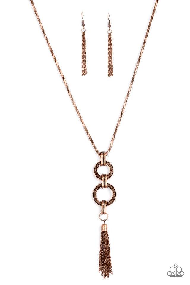 Paparazzi Accessories Full STEAMPUNK Ahead! - Copper A double stacked pendant swings from the bottom of a lengthened mesh chain for a bold industrial look. Infused with a copper tassel, shimmery mesh chain is pressed into the centers of the stacked round