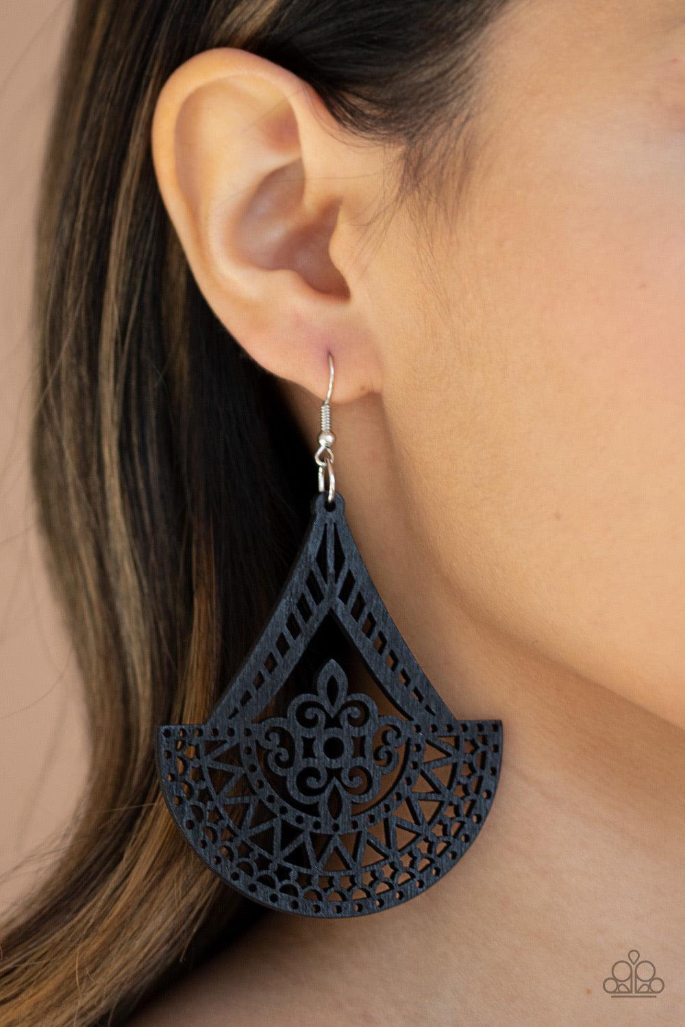 Paparazzi Accessories Tiki Sunrise - Black Stenciled in an airy wooden filigree pattern, a decorative black frame swings from the ear for a seasonal look. Earring attaches to a standard fishhook fitting. Jewelry