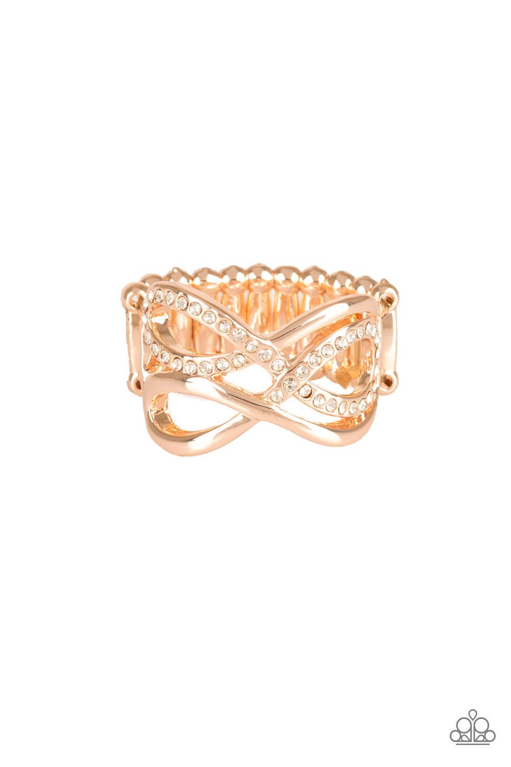 Paparazzi Accessories Infinite Illumination - Rose Gold Encrusted in sections of glittery white rhinestones, glistening rose gold infinities interweave into an airy band. Features a stretchy band for a flexible fit. Jewelry
