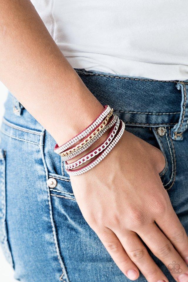 Paparazzi Accessories Fashion Fiend - Red Glassy white and smoky rhinestones are encrusted along strands of red suede. Glistening silver and gold chains are added to the bands, adding edgy industrial shimmer to the sassy palette. Features an adjustable sn