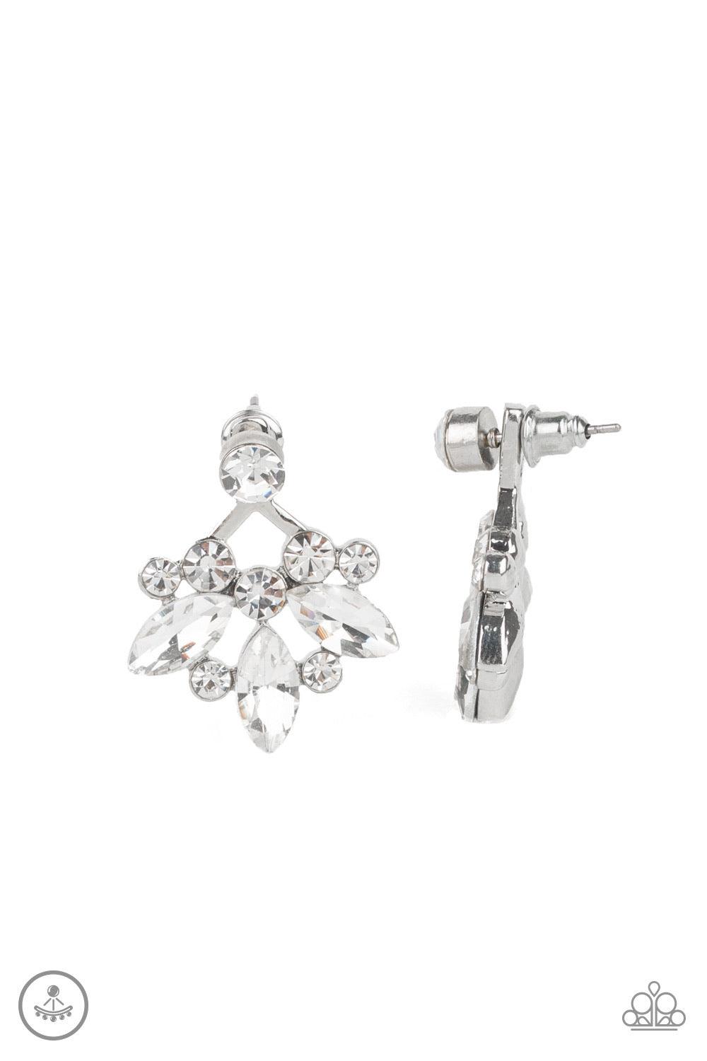 Paparazzi Accessories Crystal Constellations - White A solitaire white rhinestone attaches to a double-sided post, designed to fasten behind the ear. Radiating with a fringe of round and marquise style rhinestones, the double sided-post peeks out beneath