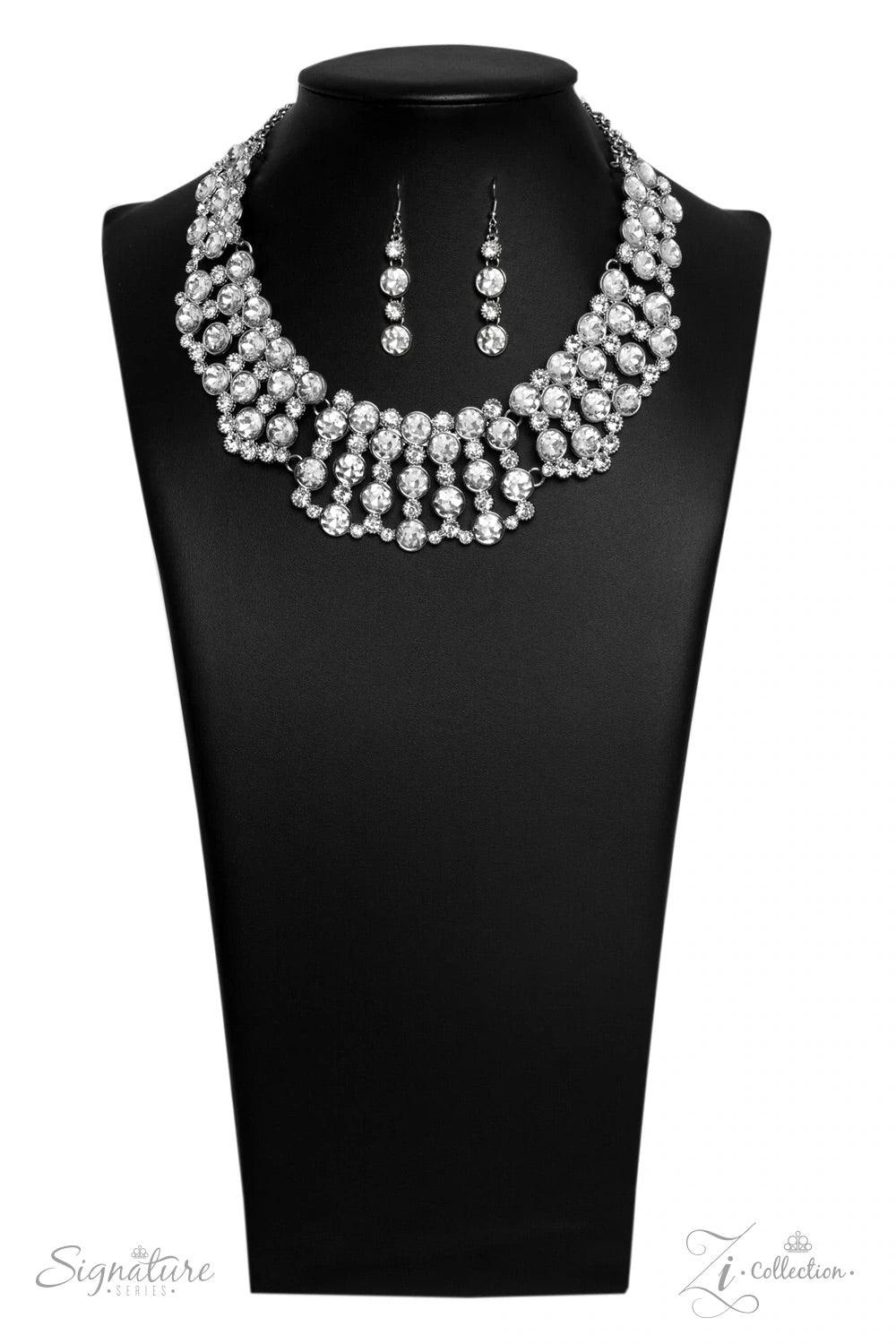 Paparazzi Accessories The Heather V Two strands of silver chain give way to a gorgeous collection of glassy white rhinestones nestled in sleek silver frames. Some of the frames are dotted in texture, adding intricate detail to the vintage-inspired design.
