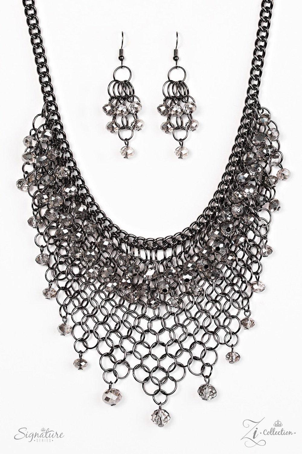 Paparazzi Accessories The Nina Interlocking gunmetal links join into a tapered mesh down the chest. Featuring a sparkling faceted surface, glittery crystal-like beading swings from the top and bottom of the fierce palette for a hypnotizing finish. Feature