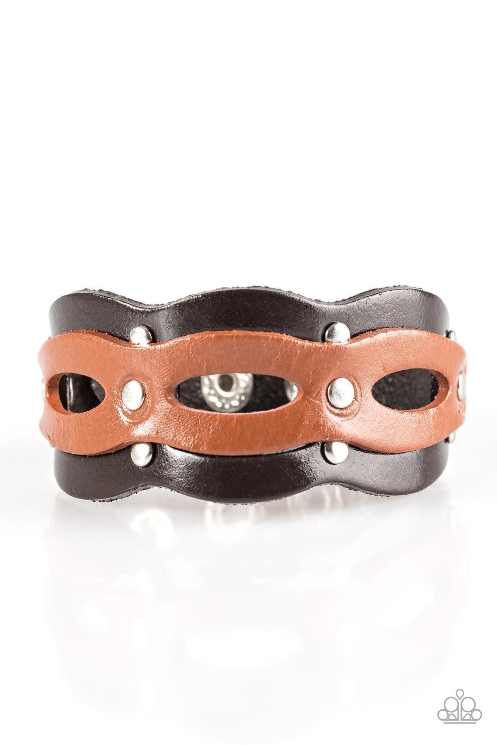 Paparazzi Accessories SPURS of The Moment - Brown Brushed in a shiny finish, an airy strip of light brown leather is studded across the front of a scalloped brown leather band for a rugged look. Features an adjustable snap closure. Jewelry