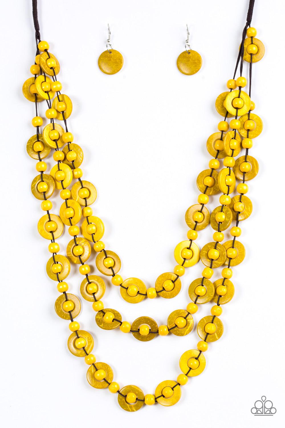 Paparazzi Accessories Bermuda Belle - Yellow Brushed in a refreshing yellow finish, wooden rings and beads are knotted in place along three strands, creating summery layers down the chest. Features a button loop closure. Jewelry