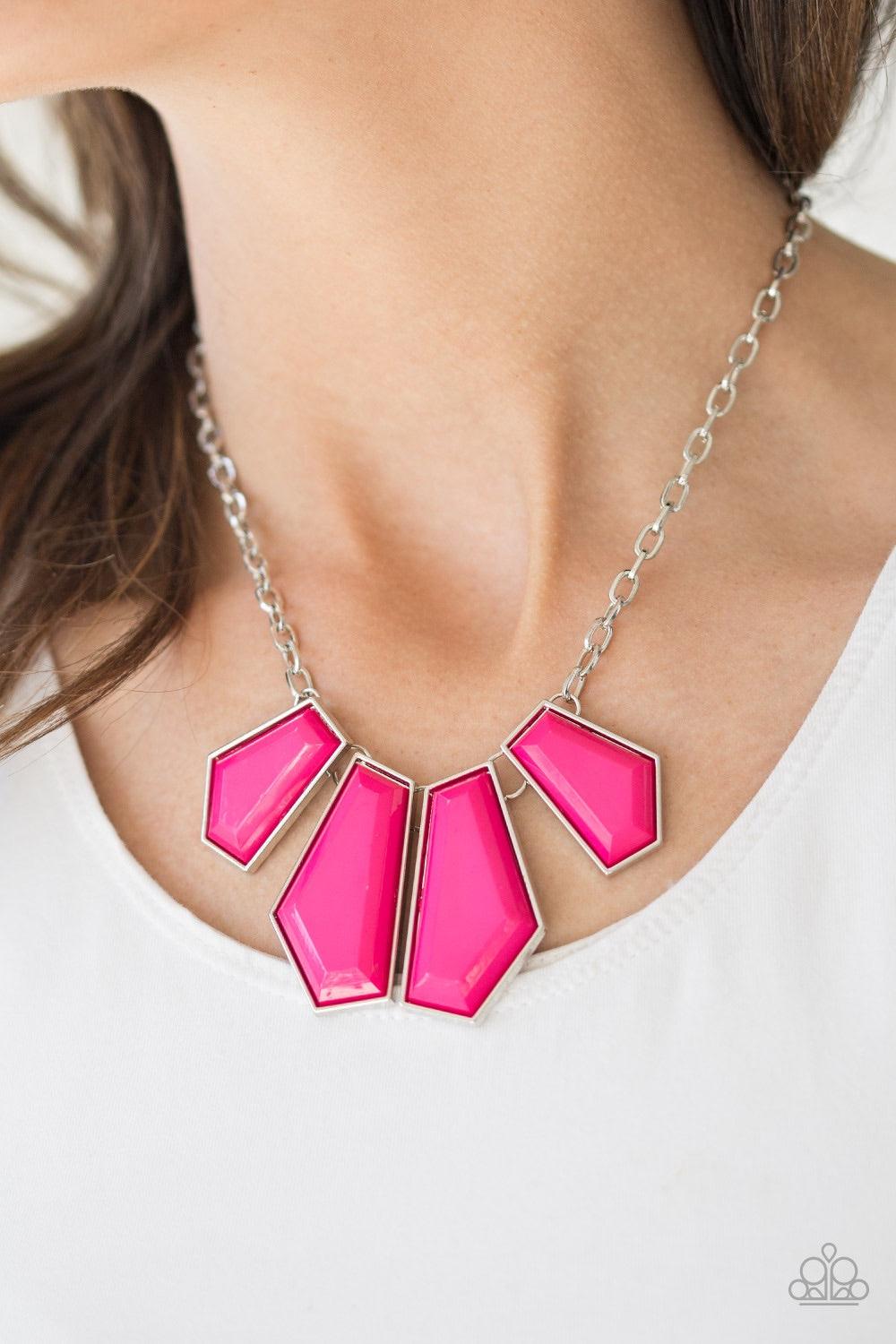Paparazzi Accessories Get Up And Geo - Pink Featuring emerald-style cuts, faceted pink beads are pressed into sleek silver frames. The colorful frames join at the bottom of a shimmery silver chain, creating a bold geometric fringe below the collar. Featur