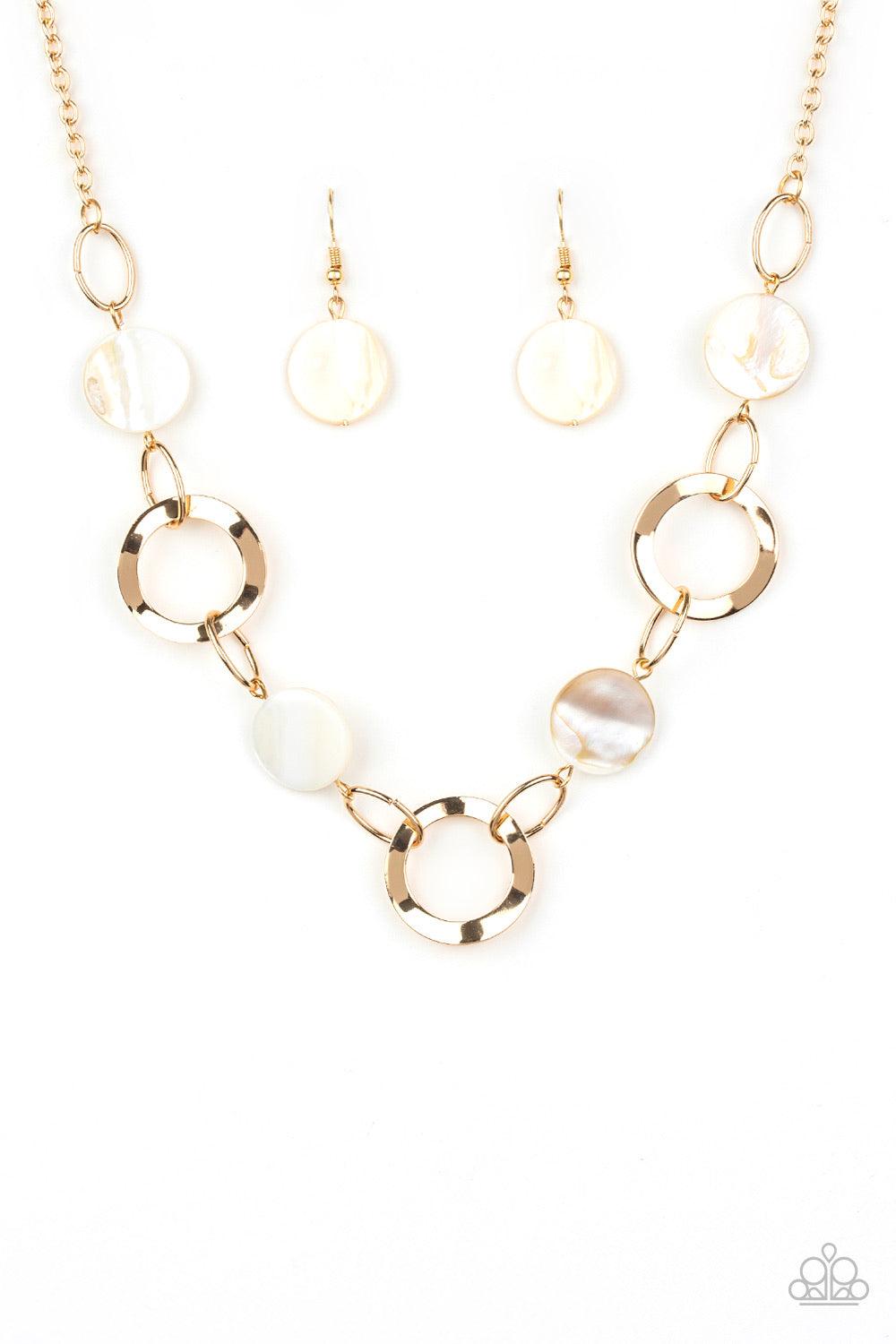 Paparazzi Accessories Bermuda Bliss - White White shell-like discs link with asymmetrical gold hoops below the collar for a colorfully seasonal look. Features an adjustable clasp closure. Jewelry