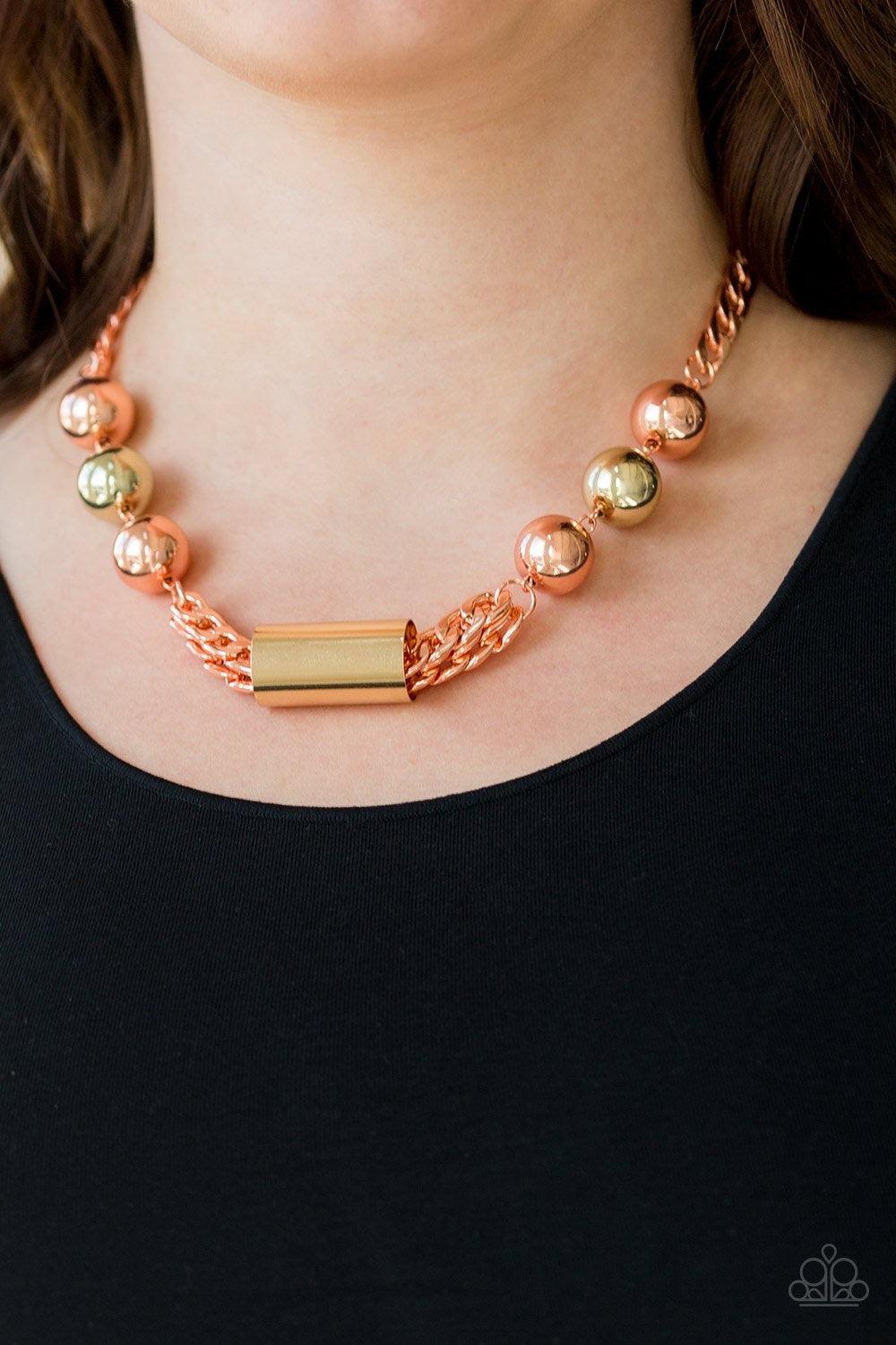 Paparazzi Accessories All About Attitude - Copper Heavy shiny copper chains give way to sections of bold gold and shiny copper beads. A glistening gold accent slides along joined rows of heavy shiny copper chains, creating a spunky industrial centerpiece