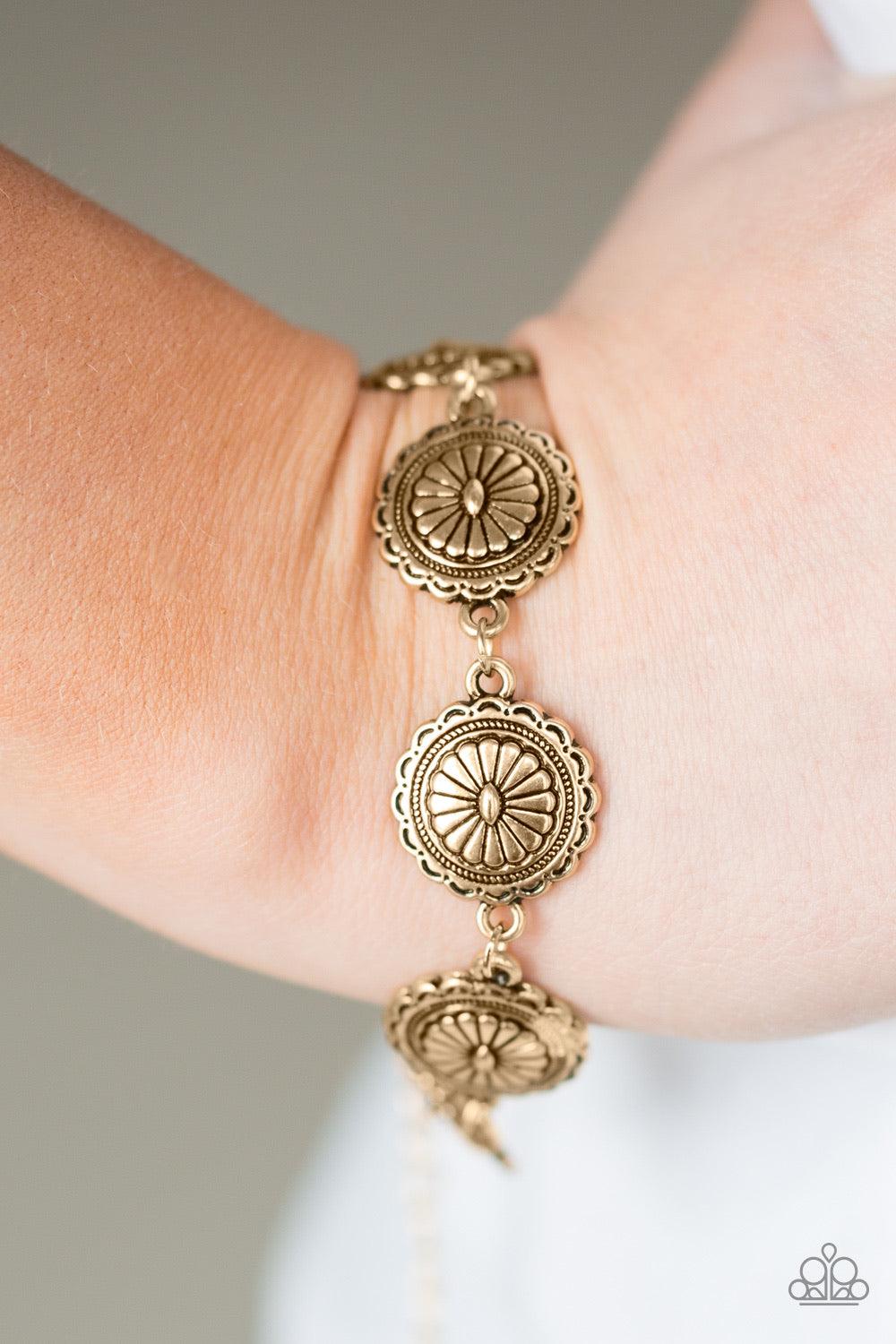 Paparazzi Accessories Prairie Posh - Gold Brushed in an antiqued finish, glistening floral frames link together around the wrist for a seasonal look. Features an adjustable clasp closure. Sold as one individual bracelet. Jewelry
