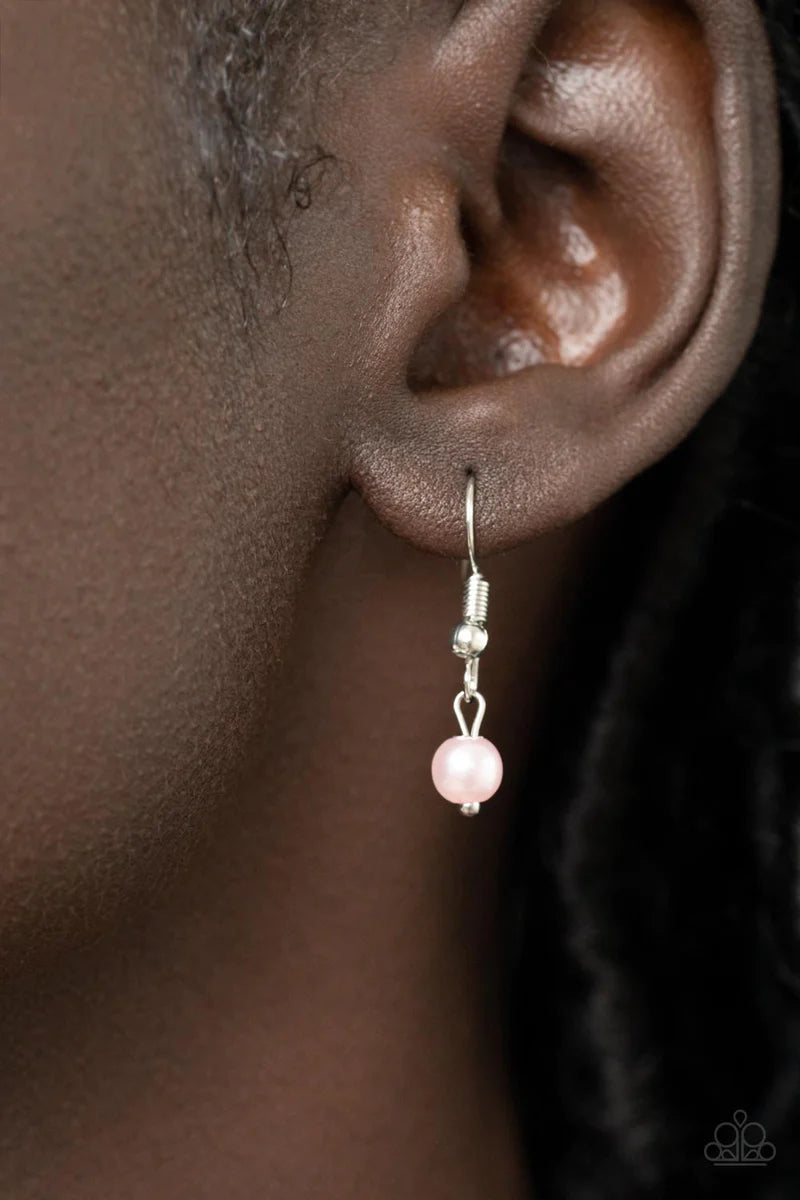 Paparazzi Accessories Pop It and LOCKET - Pink Dotted with a dainty white rhinestone, a shiny silver heart swings from the bottom of a bubbly cluster of pink pearls and white rhinestones, creating a locket inspired pendant below the collar. Features an ad