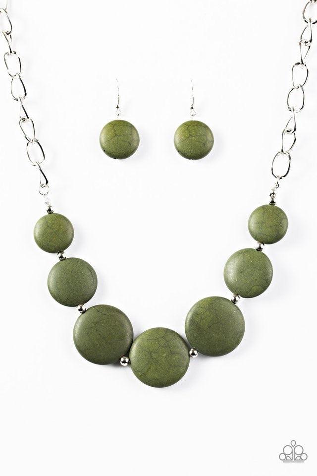 Paparazzi Accessories Bedrock Betty - Green Flat green stones link below the collar in an earthy fashion. Dainty silver beads are sprinkled between the earthy stone accents, adding hints of shimmer to the bold artisanal palette. Features an adjustable cla