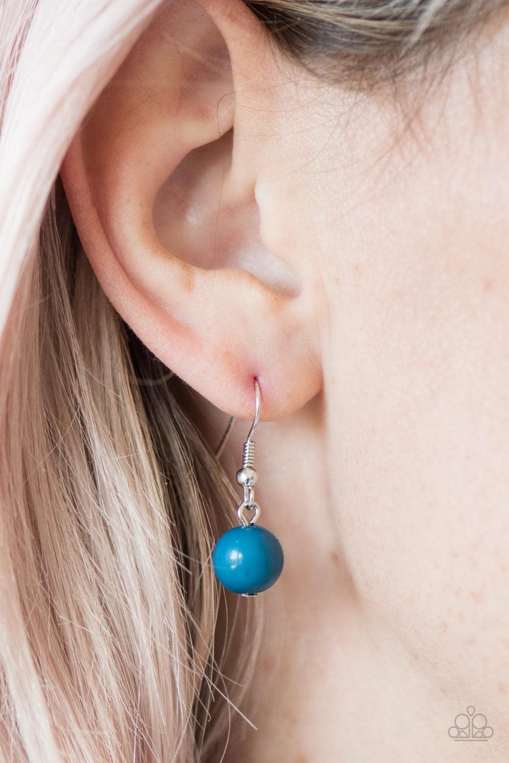 Paparazzi Accessories Jungle River - Blue Refreshing blue beads are pressed into the centers of delicately hammered silver frames, creating colorful accents below the collar. The shiny blue beads gradually increase in size as they near the center, adding