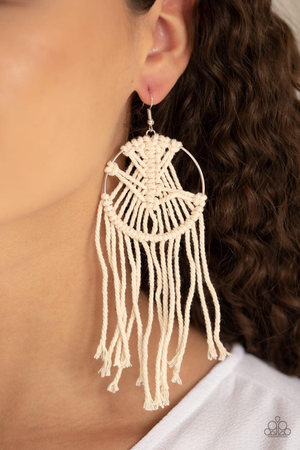 Paparazzi Accessories MACRAME, Myself and I - White Soft twine is decoratively knotted around a silver hoop, creating a trendy tassel. Earring attaches to a standard fishhook fitting. Sold as one pair of earrin Jewelry
