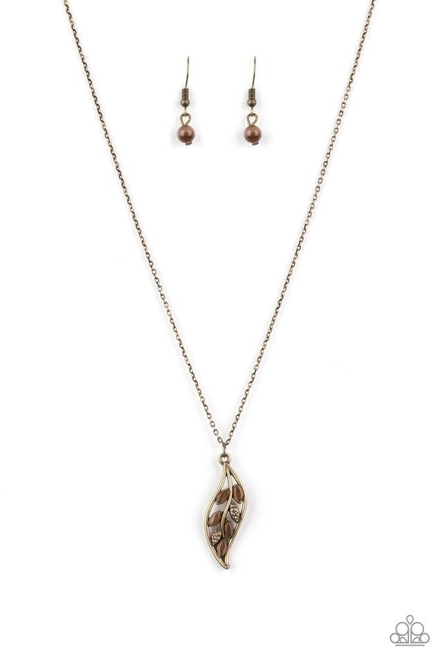 Paparazzi Accessories Let STEM Talk - Brass Glowing brown cat's eye stones and glassy white rhinestones are sprinkled along a leafy brass frame, creating a whimsical pendant below the collar. Features an adjustable clasp closure. Sold as one individual ne