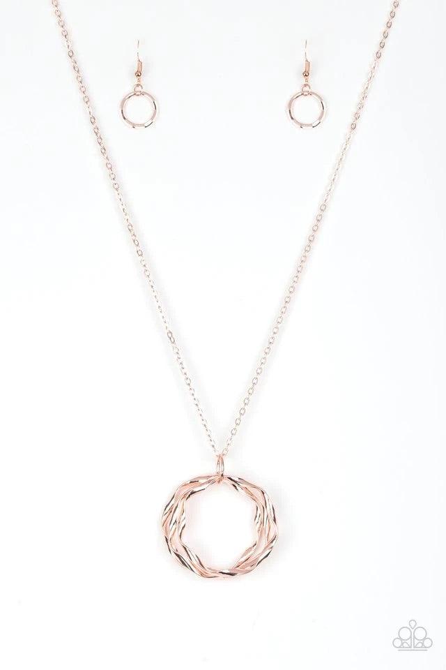 Paparazzi Accessories Millennial Minimalist - Gold Twirling rose gold hoops swing from the bottom of an elegantly elongated rose gold chain, creating a dizzying pendant. Features an adjustable clasp closure. Sold as one individual necklace. Includes one p