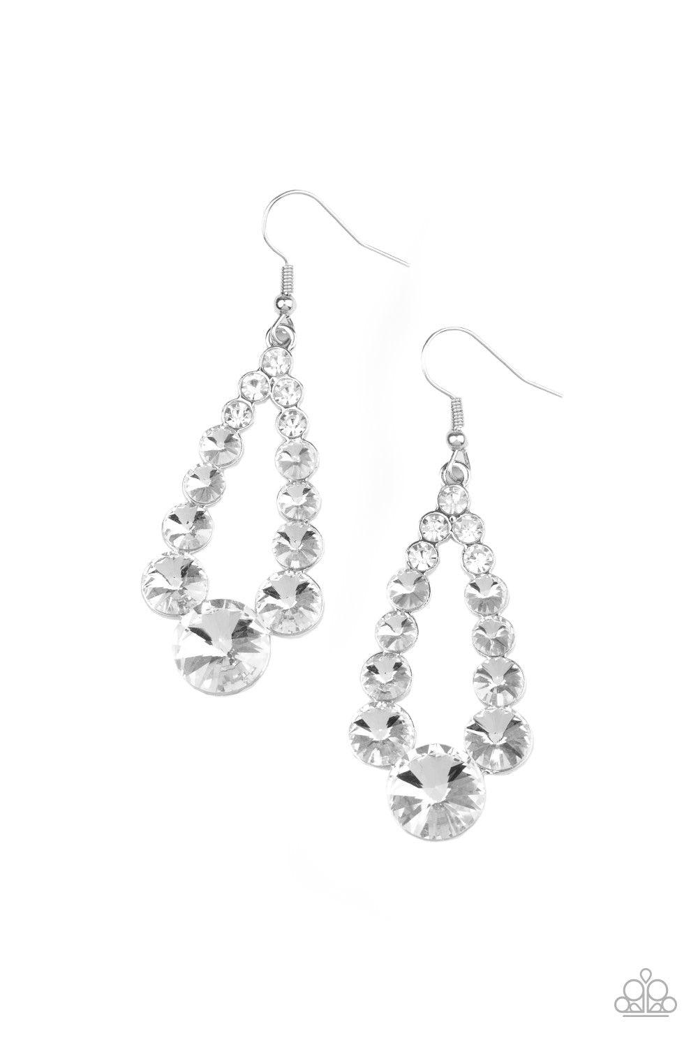 Paparazzi Accessories Here GLOWS Nothing! - White Gradually increasing in size, glittery white rhinestones coalesce into a glamorous teardrop frame for a refined look. Earring attaches to a standard fishhook fitting. Sold as one pair of earrings. Jewelry