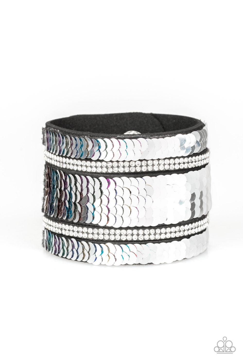 Paparazzi Accessories MERMAID Service - Multi Infused with strands of blinding white rhinestones, row after row of shimmery sequins are stitched across the front of a spliced black suede band. Bracelet features reversible sequins that change from silver t