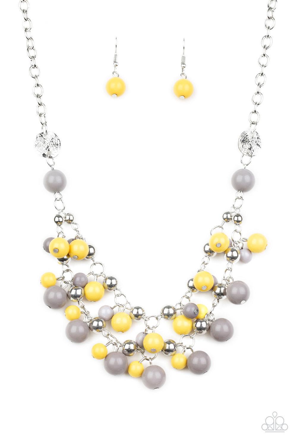 Paparazzi Accessories Seaside Soirée - Multi Hammered silver discs give way to layers of gray, yellow, and shiny silver beads. The colorful collection layers below the collar, creating a bubbly fringe. Features an adjustable clasp closure. Sold as one ind