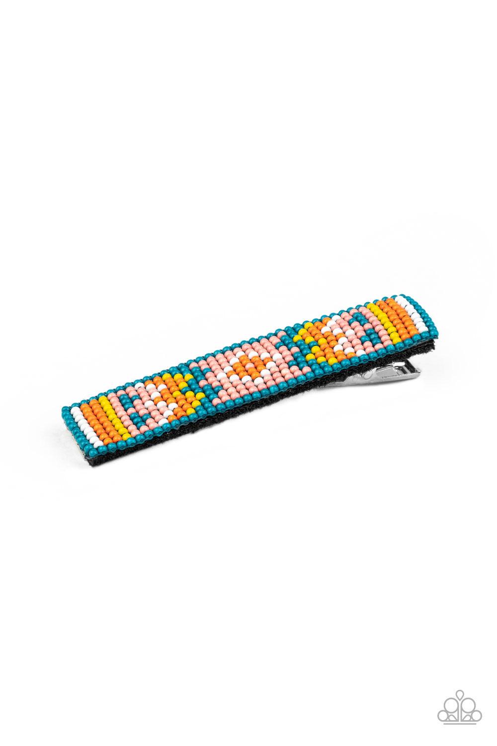 Paparazzi Accessories Lay of the Desert - Multi A dainty collection of blue, yellow, orange, white, and Rose Tan beads delicately embellish the front of a black frame, stacking into a colorful textile pattern. Features a standard hair clip on the back. So